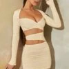 Long Sleeve Cut Out Mini Dress In Stone