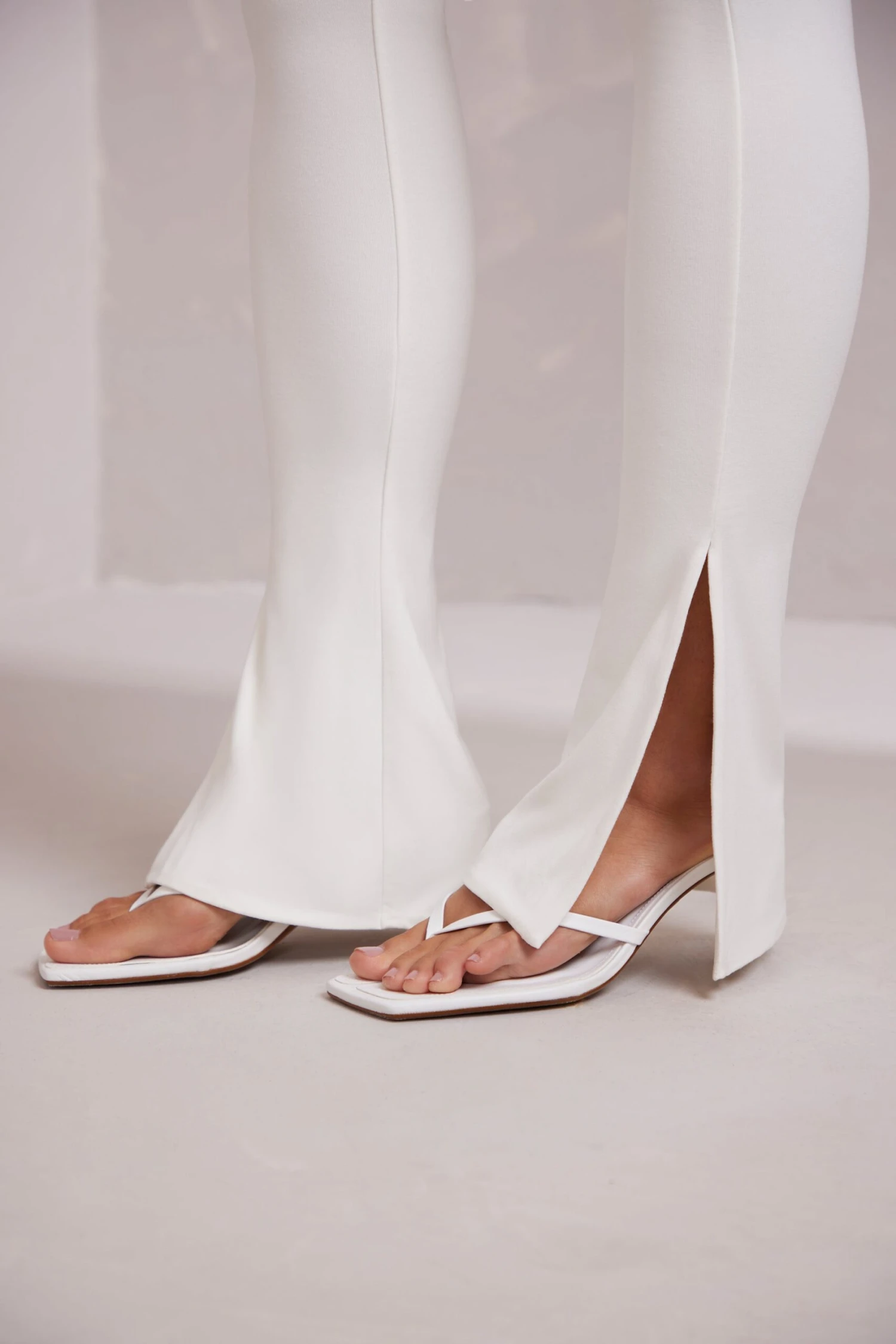 Halter Neck Plunge Jumpsuit In White - Image 4