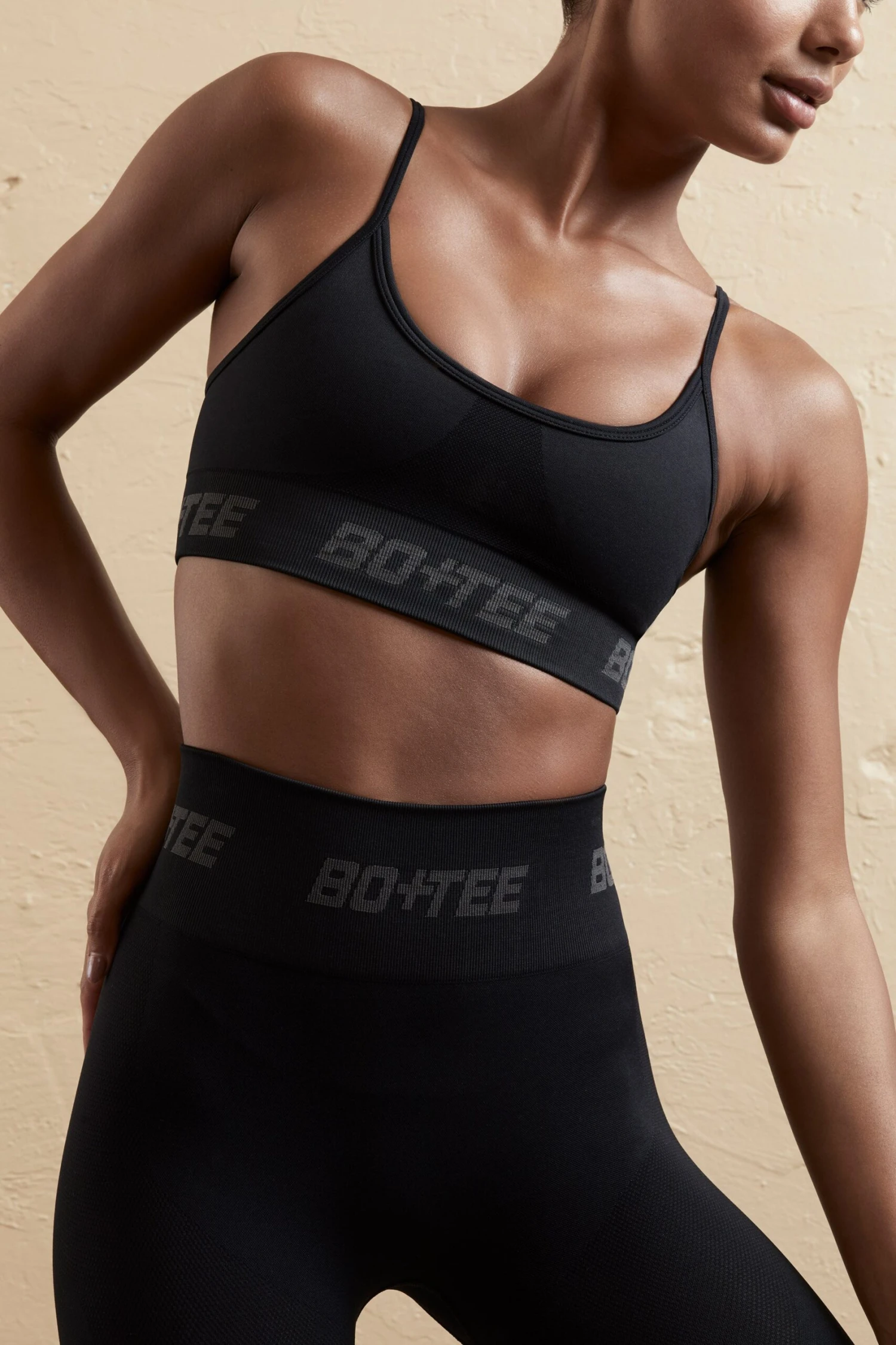 Curved Neckline Sports Bra In Black - Image 4