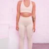 Ribbed Plunge Neck Sports Bra In Cream