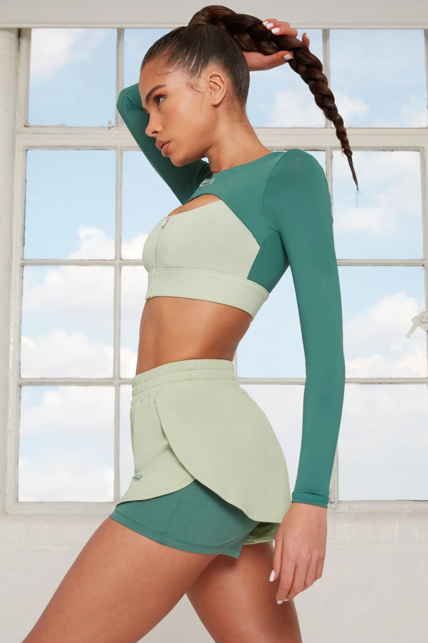 Tulip Hem Running Shorts In Green - Image 2
