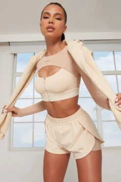 Tulip Hem Running Shorts In Beige