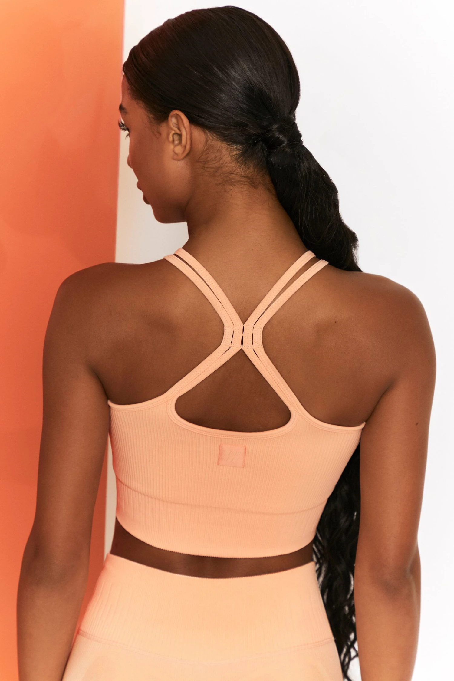 Feel Your Power Ribbed Racer Crop Top In Peach - Image 3