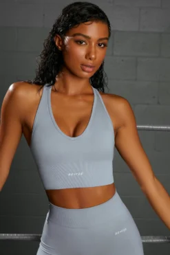 Overhaul Racer Knot Back Seamless Crop Top In Blue